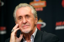 FILE - In this July 11, 2012, file photo, Miami Heat President Pat Riley listens to a question during a news conference in Miami. Fifty years ago, Riley and his teammates on Kentuckys all-white squad had just lost the national championship game to little Texas Western, which started five black players. As he left the floor that day, Riley realized he had not shaken hands with the winners. So the Kentucky star found the nerve to venture into the Texas Western locker room. (AP Photo/Lynne Sladky, File)